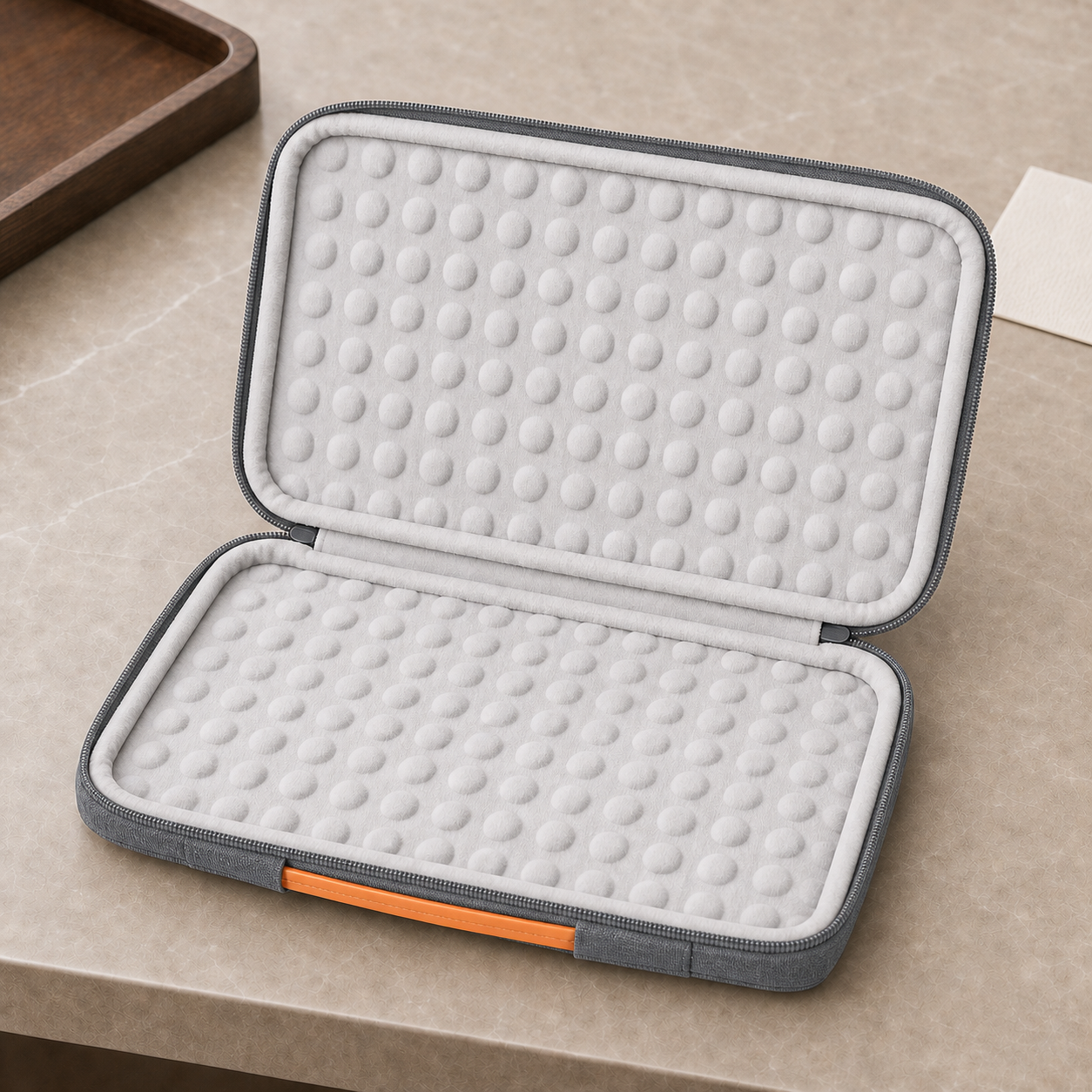 Housse ordinateur portable rembourrée glissée dans un sac
