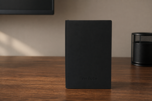Carnet de notes A5 ouvert, pages lignées et reliure thermocollée
